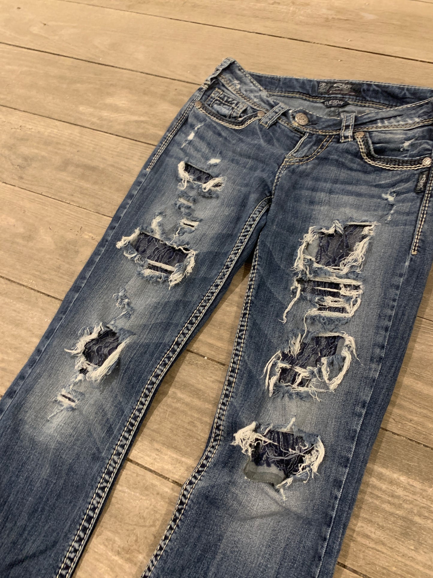 distressed low waist jeans size w25/l31